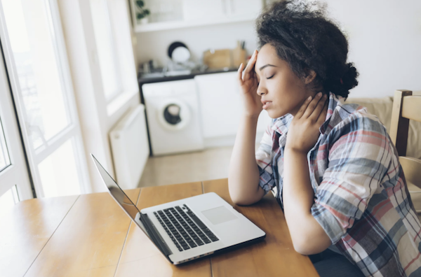 woman frustrated sitting at computer